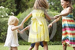 Group Of Children Playing Outdoors Together