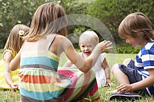 Group Of Children Playing Outdoors Together