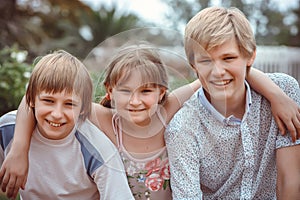 Group Of Children Playing In Park