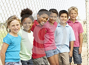 Group Of Children Playing In Park