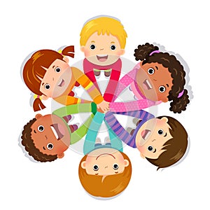 Group of children putting hands together on white background