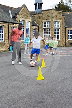 Group Of Children In School Physical Education Class