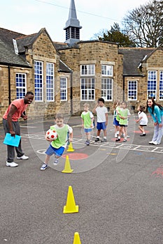 Group Of Children In School Physical Education Class