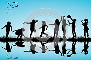 Group of children silhouettes playing outdoor