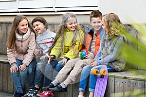 Group of children sitting on bench