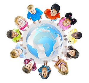 Group of Children Standing around World Map