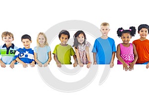 Group of Children Standing Behind Banner