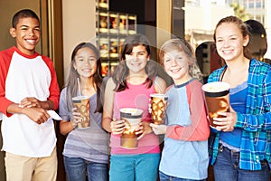 Group Of Children Standing Outside Cinema Together