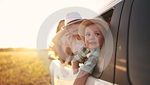 group of children travels by car. travel family vacation summer adventure by car concept. group of children in an open