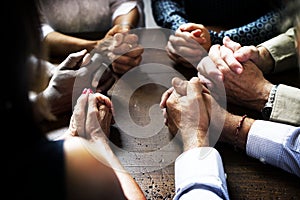 Group of christian people are praying together