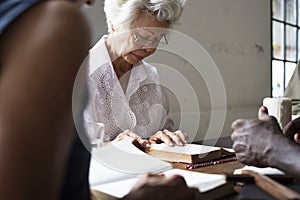 Group of Christian people are studying bible together