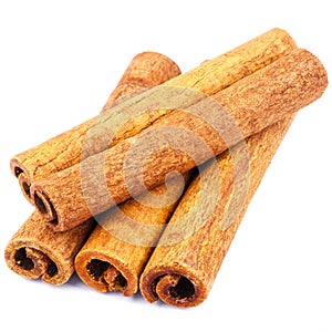 Group of cinnamon sticks isolated on white background.