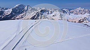 A group of climbers makes an acclimatization hike on Mount Elbrus