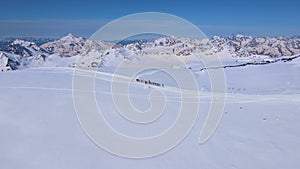 A group of climbers makes an acclimatization hike on Mount Elbrus