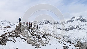 Group climbers summit adventures and achievements