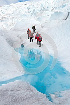 Group of climbers in a surreal world of ice