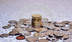 Group of coins with single stack of coins,concept photo.
