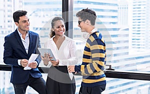 Group of colleagues discuss business plans in the office, Business teamwork.