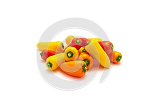 Group of colorful red, yellow and orange mini sweet peppers snack isolate on white