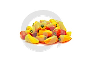 Group of colorful red, yellow and orange mini sweet peppers snack isolate on white