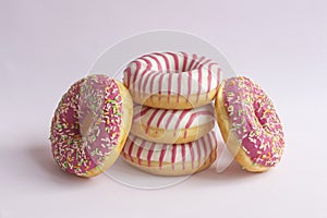 Doughnuts on pink background