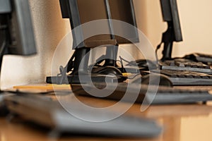 Group of computer neatly placed in a computer lab shallow dof