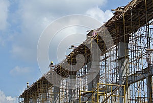 Group of construction worker fabricating beam formwork