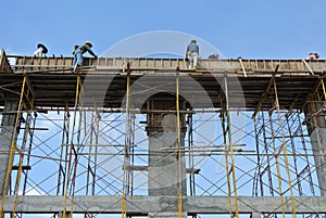 Group of construction worker fabricating beam formwork