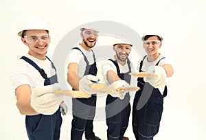 Group of construction workers .isolated on white