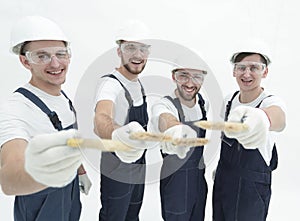 Group of construction workers .isolated on white