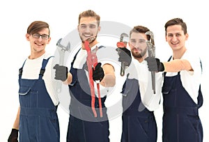 Group of construction workers with working tools