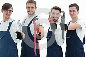 Group of construction workers with working tools