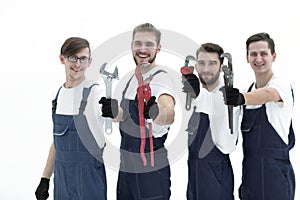 Group of construction workers with working tools