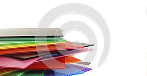 Group of corrugated plastic sheets on white