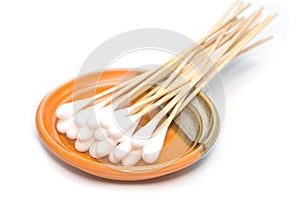 Group of cotton sticks in plate