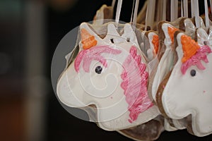 Group of cute sweet sugar milky candy Unicorn shape, homemade children attraction stuff from street food