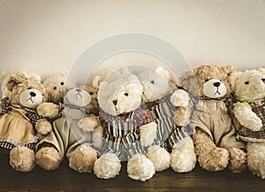 A group of cute teddy bears sitting together