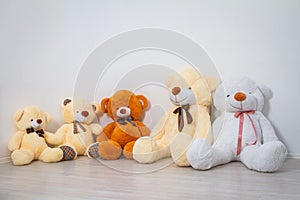 Group of cute teddy bears sitting