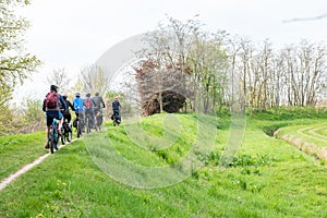 a group of cyclists riding