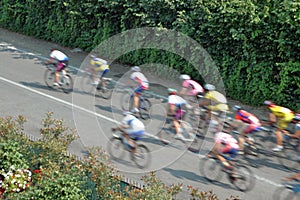 group of cyclists in a road race, motion blur