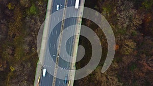 Group of cyclists team ride down the road. Friends on bikes ride together have fun outdoors. Aerial drone shot of cyclists ride