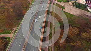 Group of cyclists team ride down the road. Friends on bikes ride together have fun outdoors. Aerial drone shot of cyclists ride