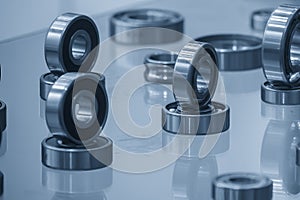 The group of cylindrical rolling bearing parts in light blue scene