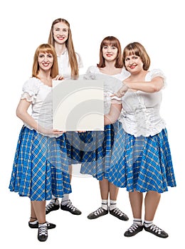 Group of dancers of Scottish dance with empty banner