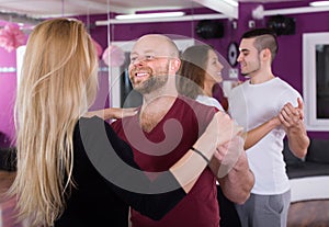 Group dancing in club photo