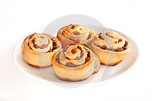 Group of delicious swirl buns with raisins and brown sugar