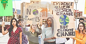 Group of demonstrators on road, young people from different culture and race fight for climate change - Global warming and