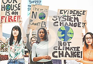 Group of demonstrators on road, young people from different culture and race fight for climate change - Global warming and