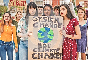 Group of demonstrators on road, young people from different culture and race fight for climate change - Global warming and