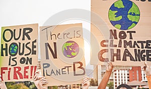 Group of demonstrators on road, young people from different culture and race fight for climate change - Global warming and